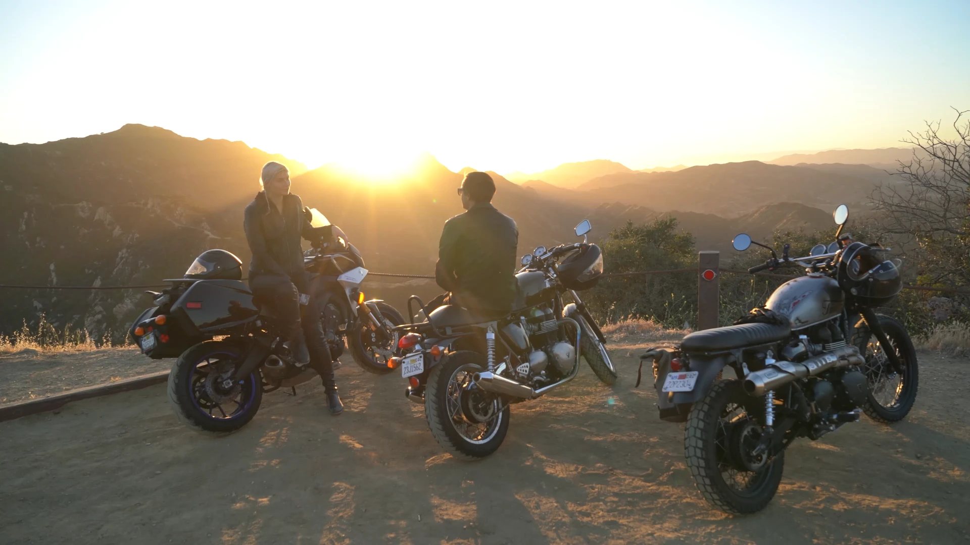 A rider on an open road at dusk